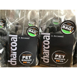 Charcoal dog biscuits in compostable packaging